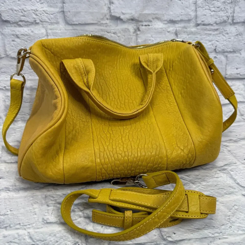 Alexander Wang Rocco Duffel Bag Mustard Yellow Pebbled Leather Studded Bottom